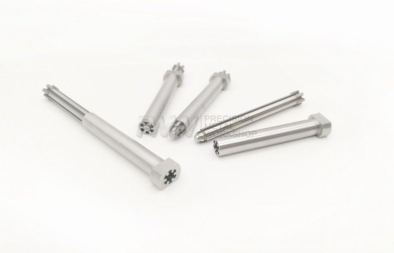 Machined steel parts with a sleeve and a moving slide inside material tool steel